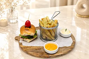 Kids burger with french fries providing a fun and satisfying meal at Moda Cafe.