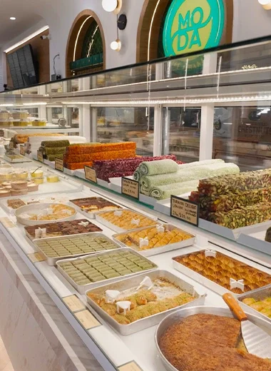Artisan bakery items, traditional Turkish breakfast, and premium brunch selection served at Moda Cafe & Bakery in Richmond, Texas, in a cozy and modern setting.
