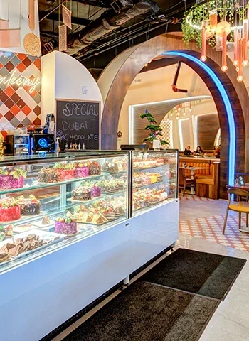 Signature Mediterranean dishes served at Moda Mediterranean Restaurant, featuring fresh ingredients, elegant presentation, and a warm fine dining atmosphere.